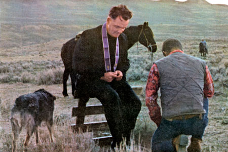 Cowboy Confession: Fr. Charles Brady.  Photo credit: Pat Coffey, Catholic Extension Magazine, 1967